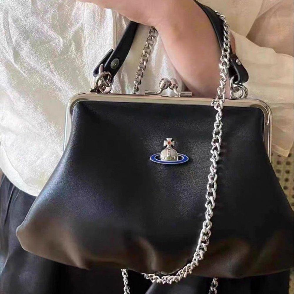 Gently used with hardly any wear. Vivienne Westwood